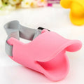 Pink silicone duckbill with gray strap on a white background